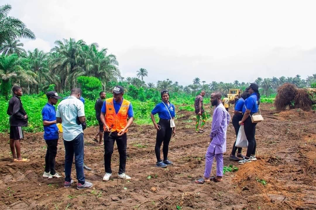 Sunik staff and clients on a site visit at the farm estate